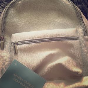 Ariana Grande white leather and fluffy backpack